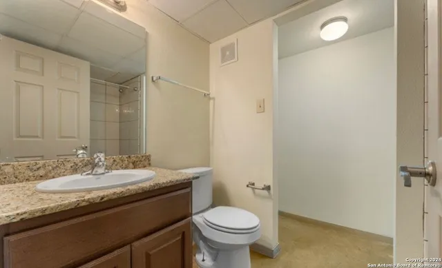 a bathroom with a tub and shower