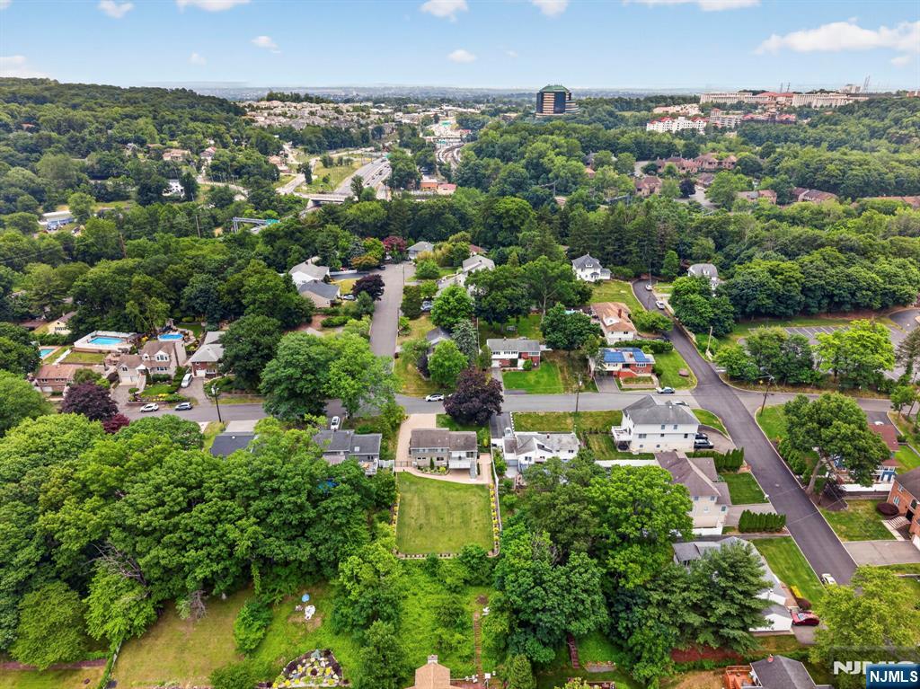 57 Hemlock Road Little Falls, NJ 07424 - Photo 44 of 50 an aerial view of a city with lots of residential buildings
