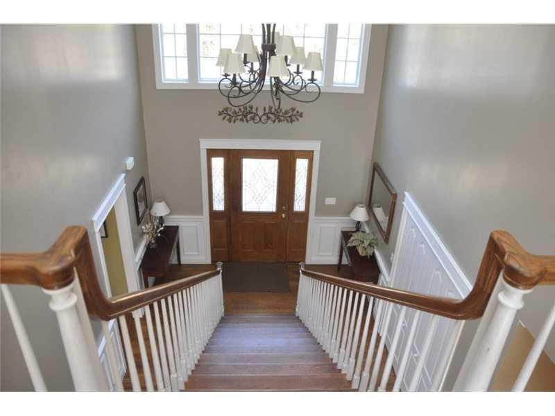 238 Dunn Road Belgrade, ME 04917 - Photo 25 of 26 Foyer. Grand custom staircase