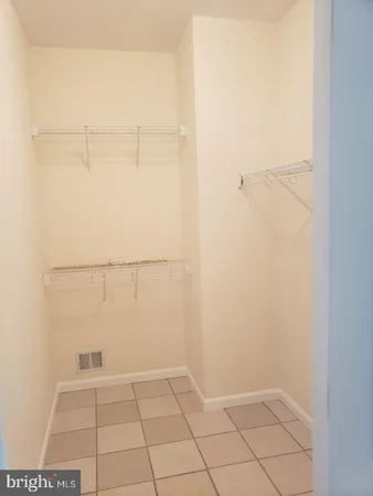 a view of an empty walk in closet