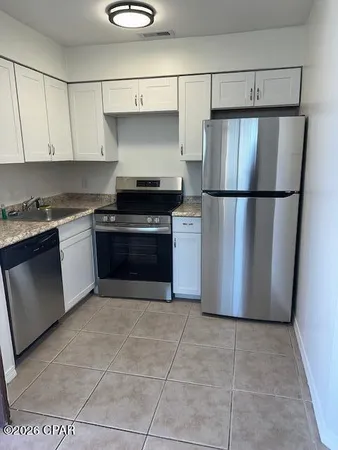 $149,000 | 4114 Holiday Drive, Unit 7, Panama City Beach, FL 32408