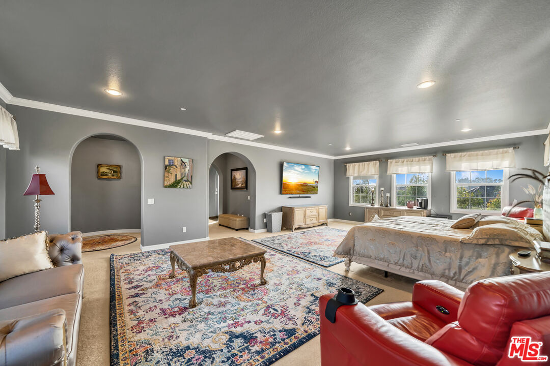 7313 Rocky Top Circle Moorpark, CA 93021 - Photo 14 of 33 a living room with furniture and a large window