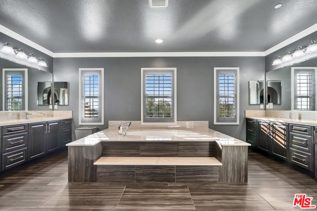 7313 Rocky Top Circle Moorpark, CA 93021 - Photo 15 of 33 a room with wooden floors and white walls