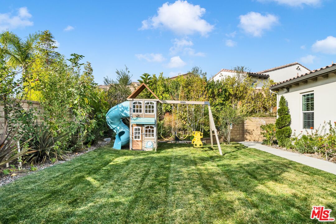 7313 Rocky Top Circle Moorpark, CA 93021 - Photo 22 of 33 a view of a house with a yard