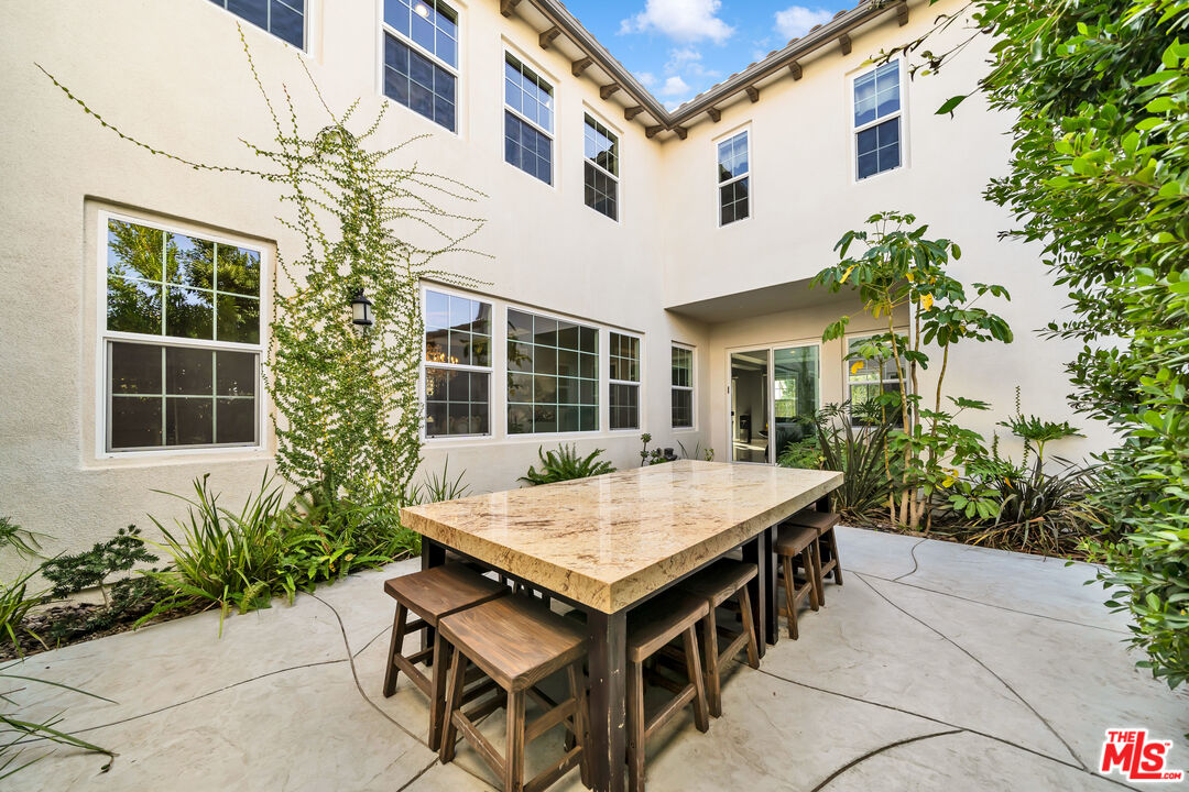 7313 Rocky Top Circle Moorpark, CA 93021 - Photo 29 of 33 a view of a dinning table and chairs in patio