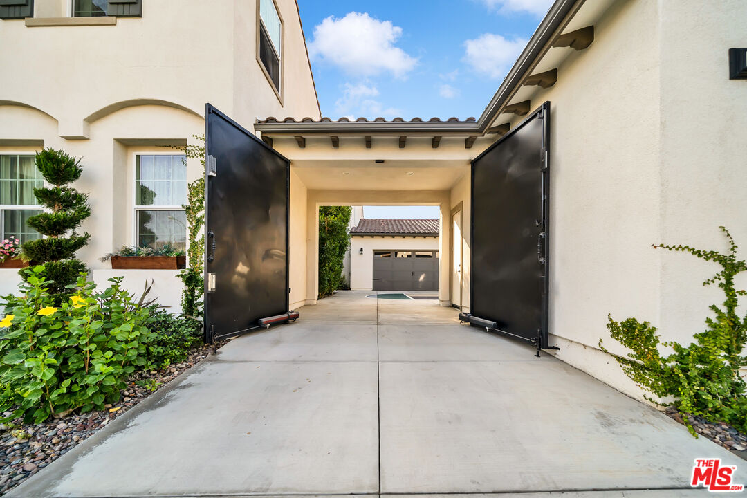 7313 Rocky Top Circle Moorpark, CA 93021 - Photo 30 of 33 a view of a house with potted plants