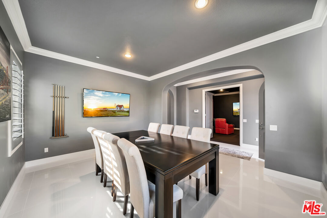 7313 Rocky Top Circle Moorpark, CA 93021 - Photo 4 of 33 a view of a dining room with furniture and chandelier