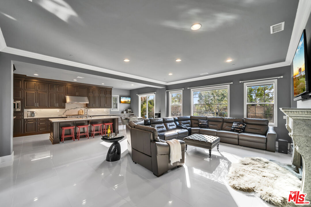 7313 Rocky Top Circle Moorpark, CA 93021 - Photo 7 of 33 a living room with furniture and a large window