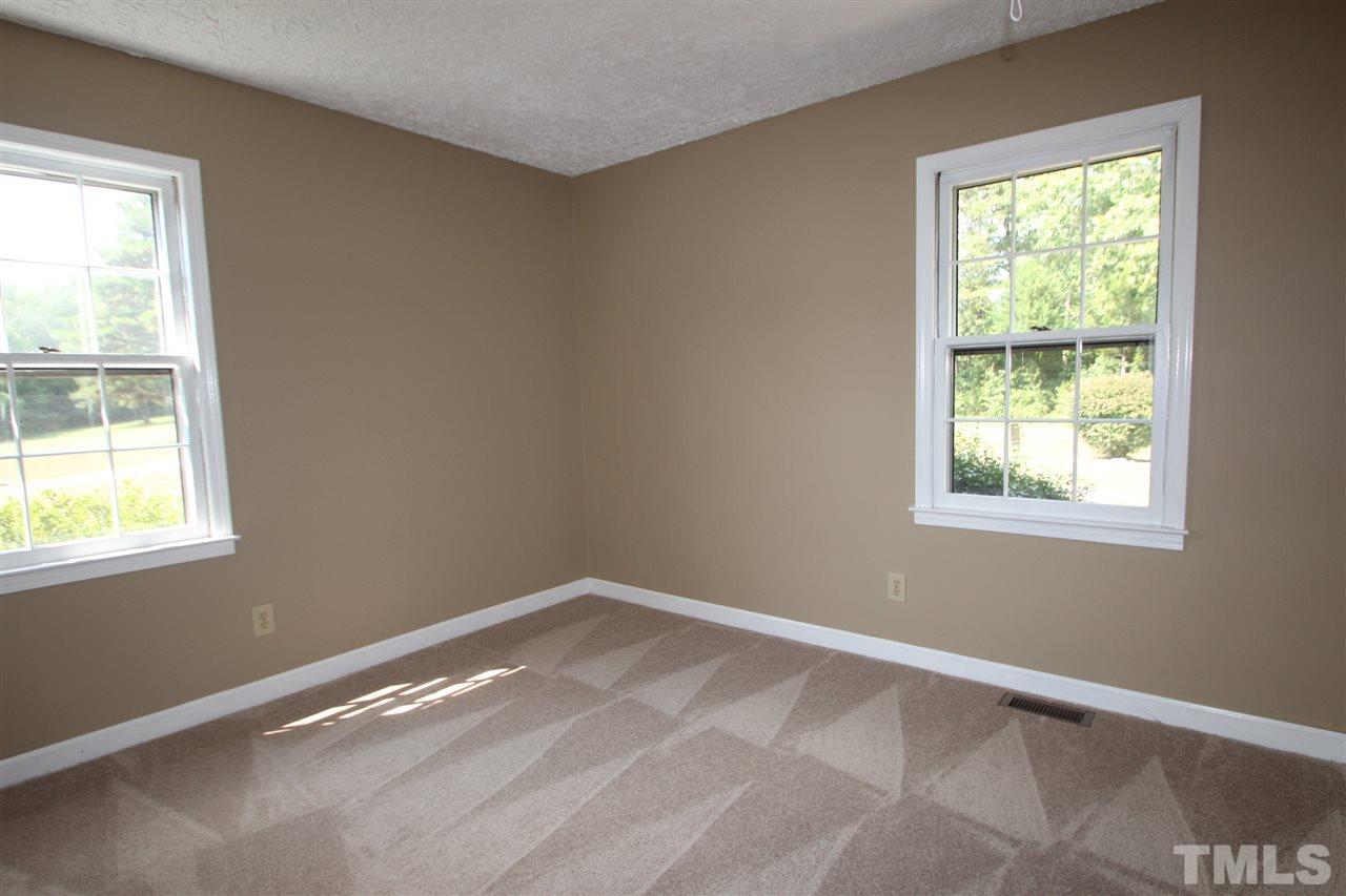 510 Fontaine Road Roxboro, NC 27574 - Photo 8 of 10 a view of an empty room with a window