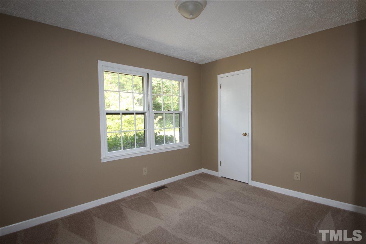 510 Fontaine Road Roxboro, NC 27574 - Photo 9 of 10 an empty room with a window