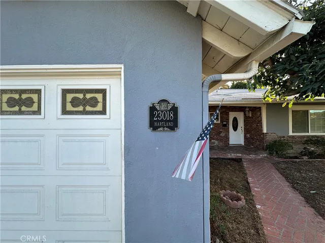 a front view of a house with entryway