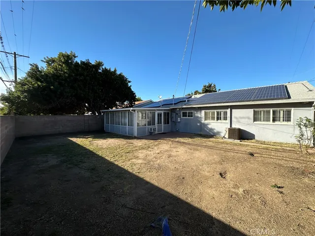 a front view of a house with yard