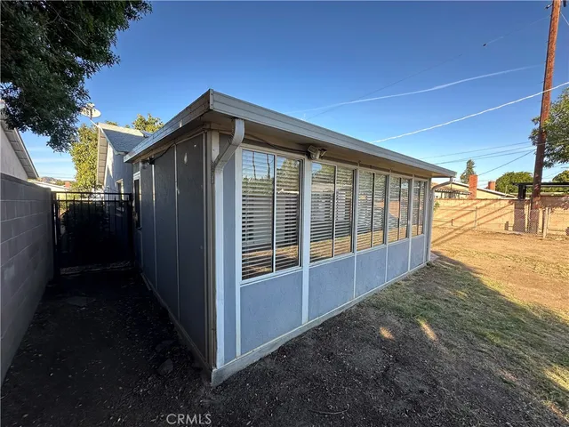 a view of an empty room with a balcony