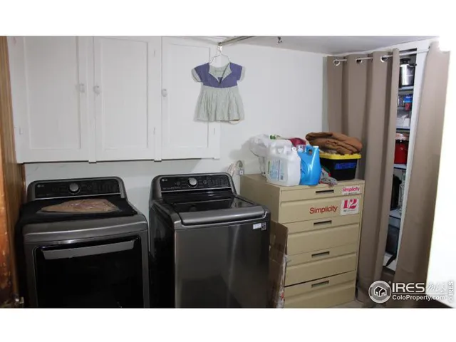 a kitchen with a stove and a refrigerator