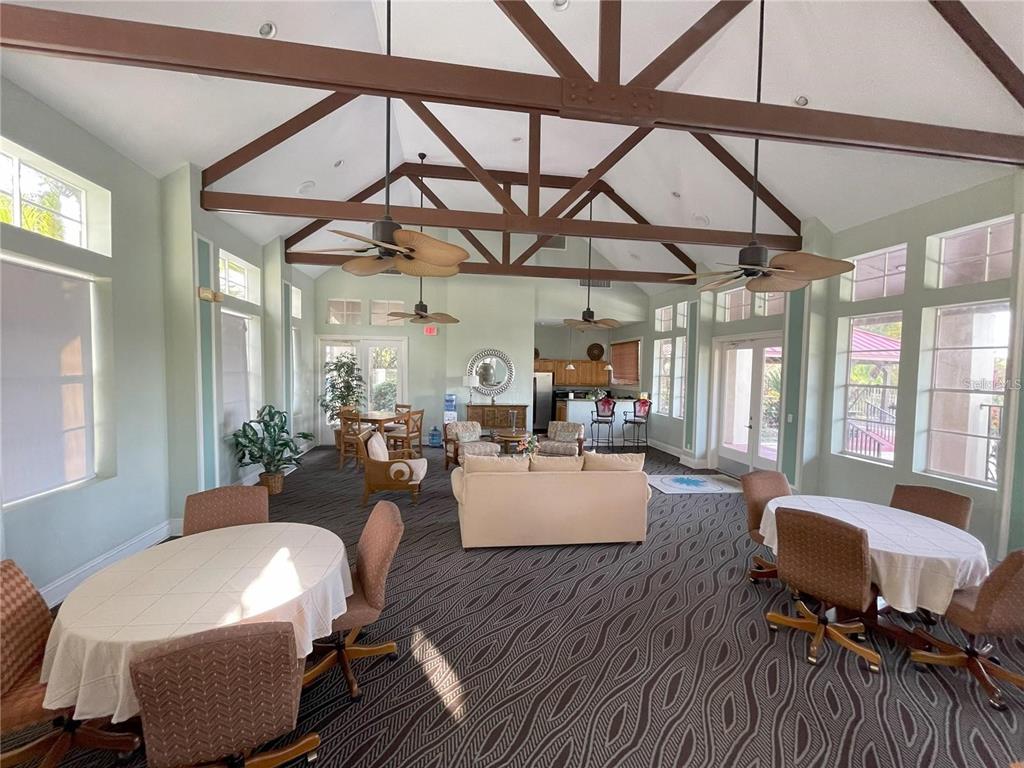 238 Afton Square, Unit 106 Altamonte Springs, FL 32714 - Photo 26 of 33 a living room with furniture and a large window