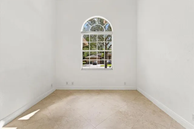 an empty room with window