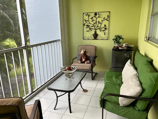 a room with furniture and rug