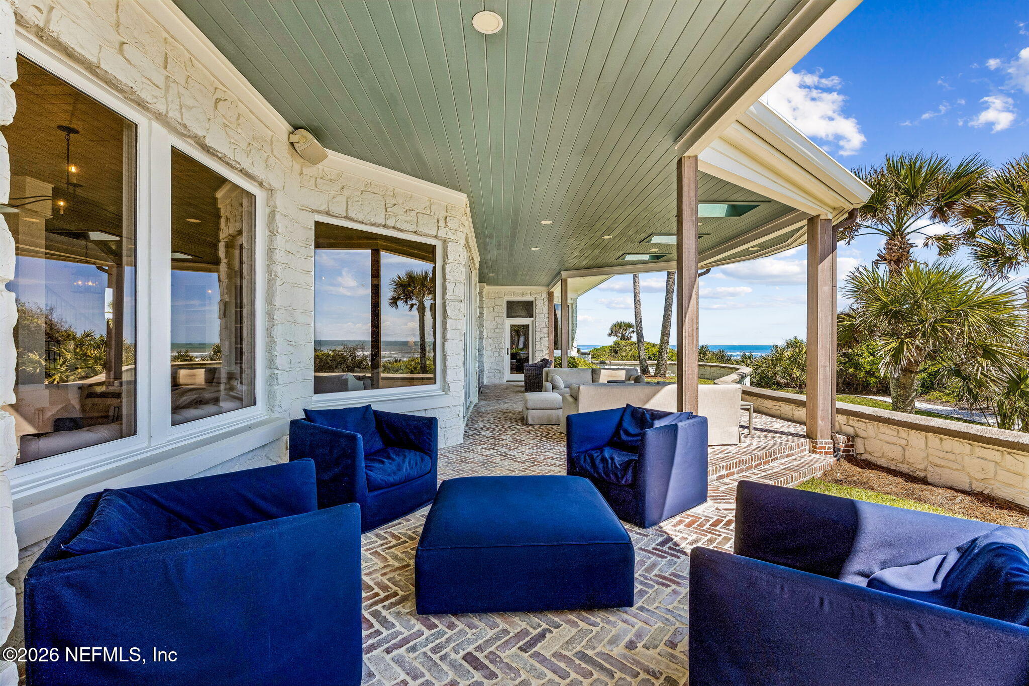 4 Ocean Ridge Court Ponte Vedra Beach, FL 32082 - Photo 106 of 132 a living room with furniture and a large window