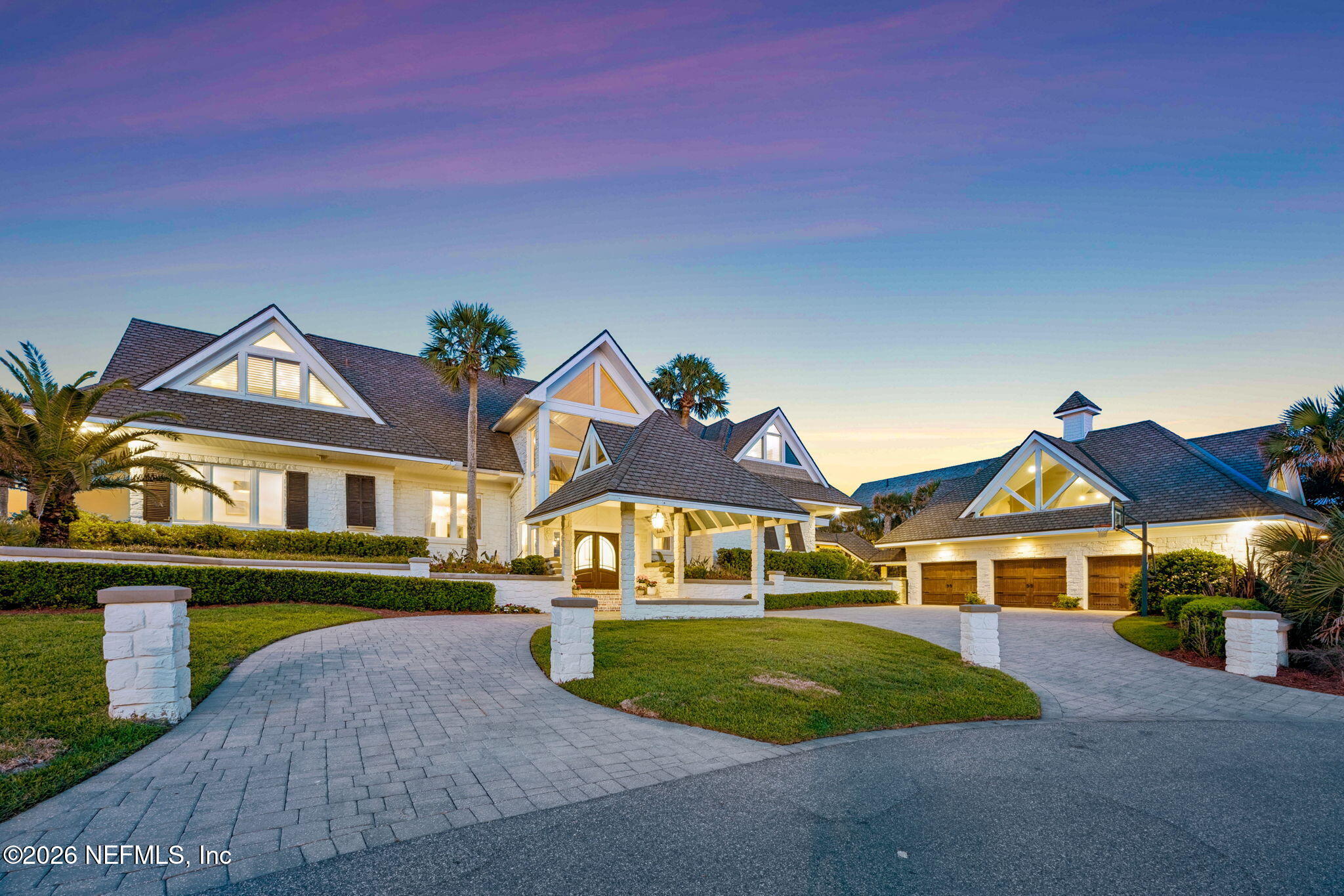4 Ocean Ridge Court Ponte Vedra Beach, FL 32082 - Photo 119 of 132 a front view of a house with a yard and garage