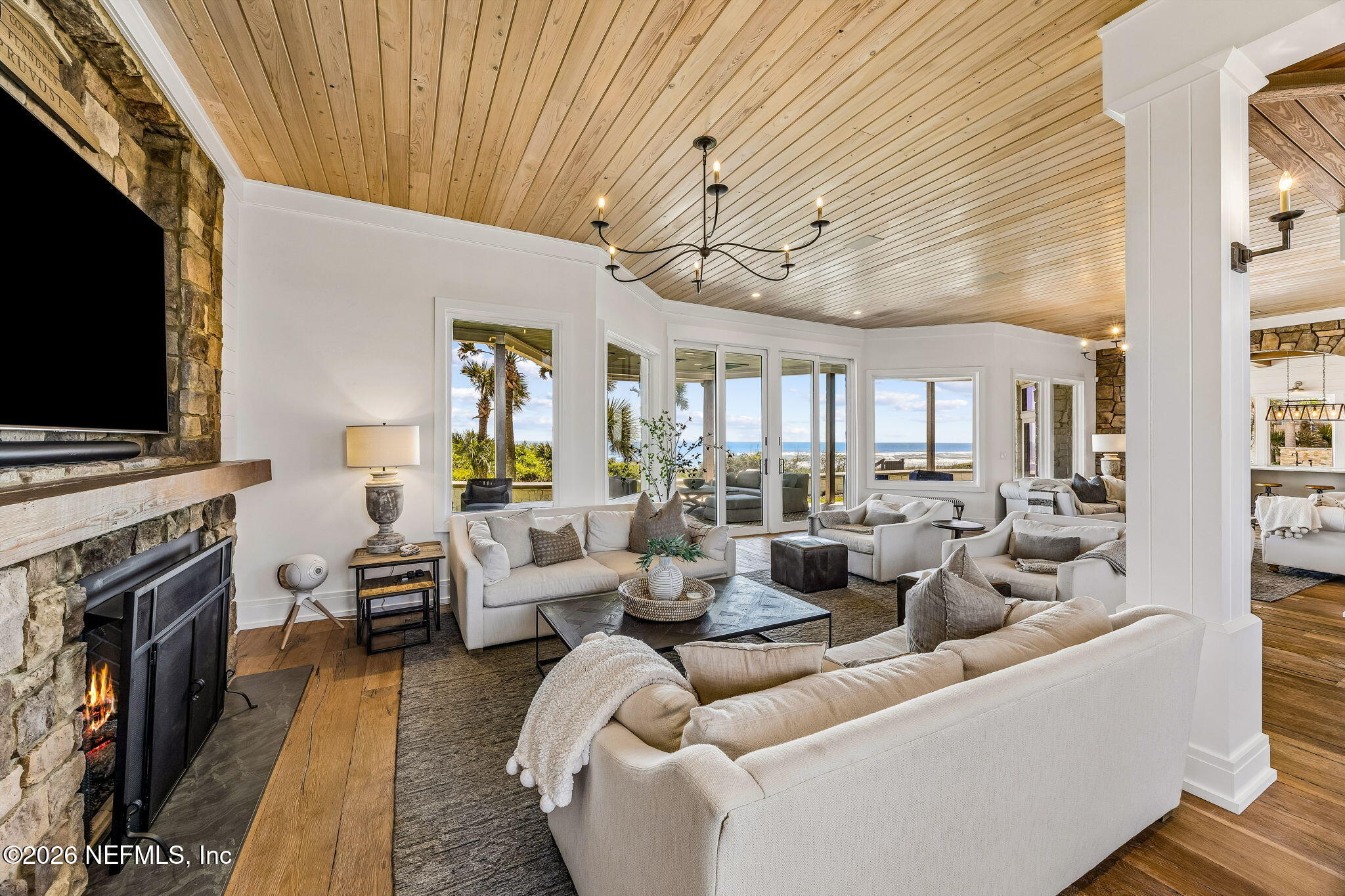 4 Ocean Ridge Court Ponte Vedra Beach, FL 32082 - Photo 22 of 132 a living room with fireplace furniture and a flat screen tv
