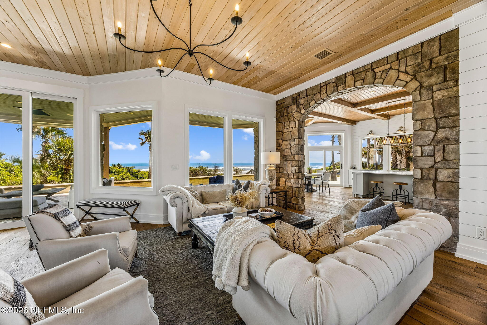 4 Ocean Ridge Court Ponte Vedra Beach, FL 32082 - Photo 27 of 132 a living room with furniture and a large window