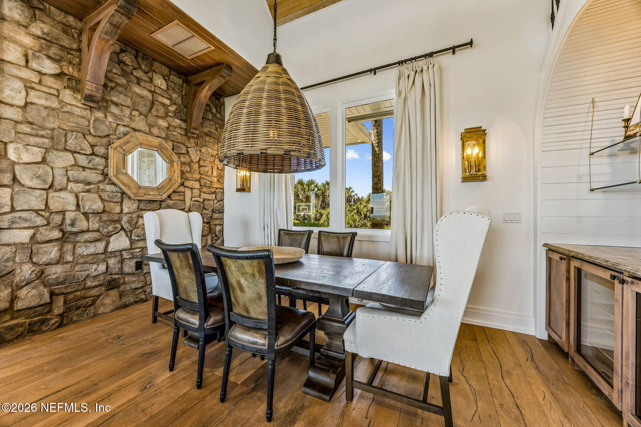 4 Ocean Ridge Court Ponte Vedra Beach, FL 32082 - Photo 36 of 132 a view of a dining room with furniture and wooden floor