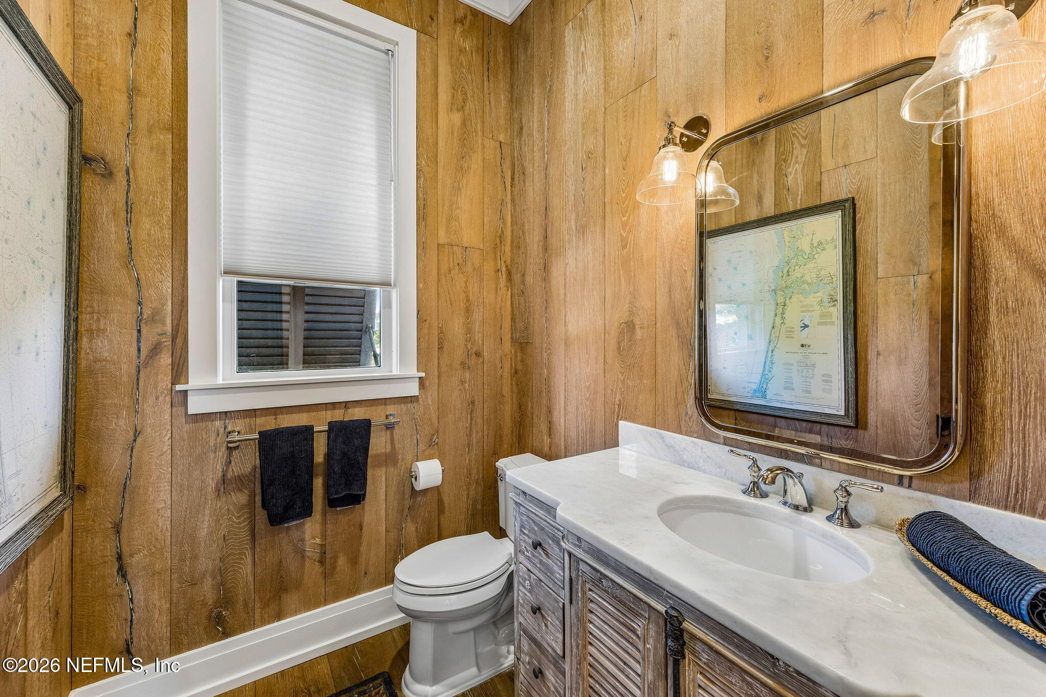 4 Ocean Ridge Court Ponte Vedra Beach, FL 32082 - Photo 37 of 132 a bathroom with a granite countertop toilet sink and mirror