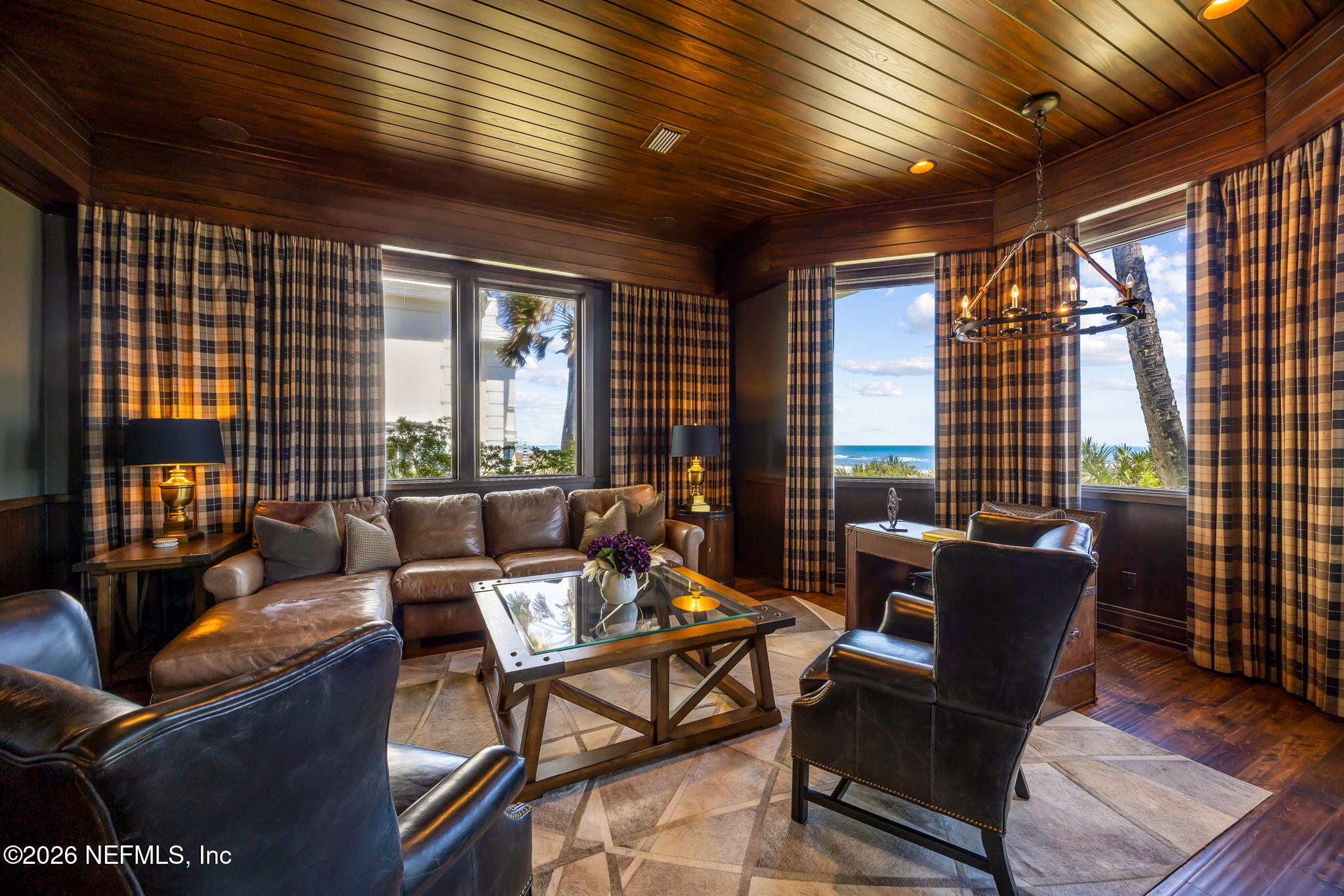 4 Ocean Ridge Court Ponte Vedra Beach, FL 32082 - Photo 38 of 132 a living room with furniture and a large window