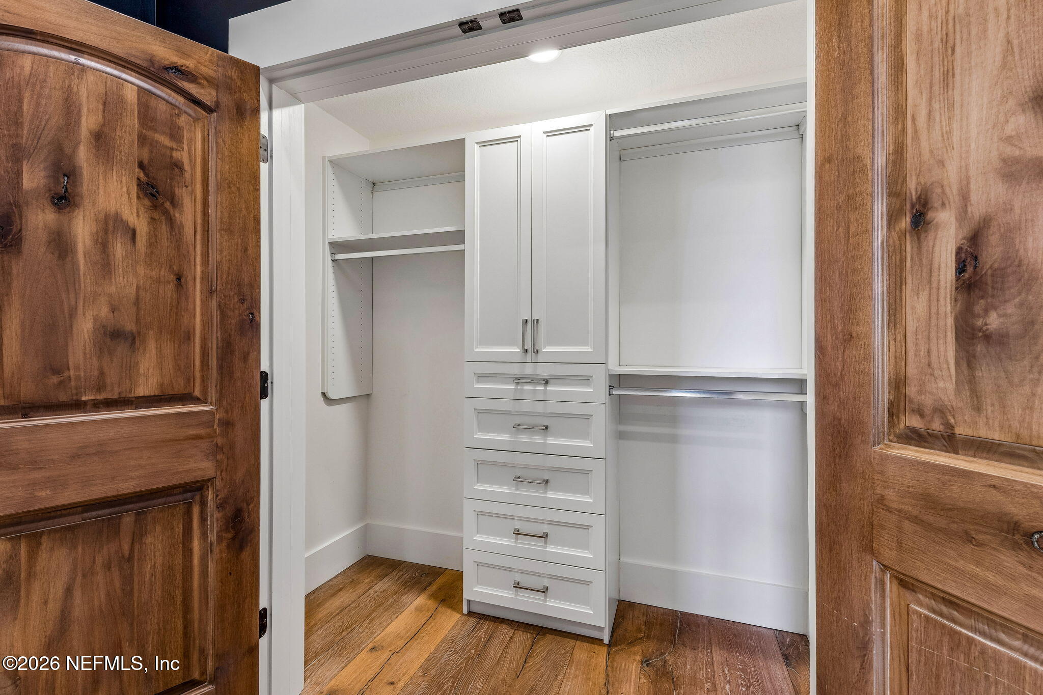 4 Ocean Ridge Court Ponte Vedra Beach, FL 32082 - Photo 47 of 132 a view of walk in closet with empty racks