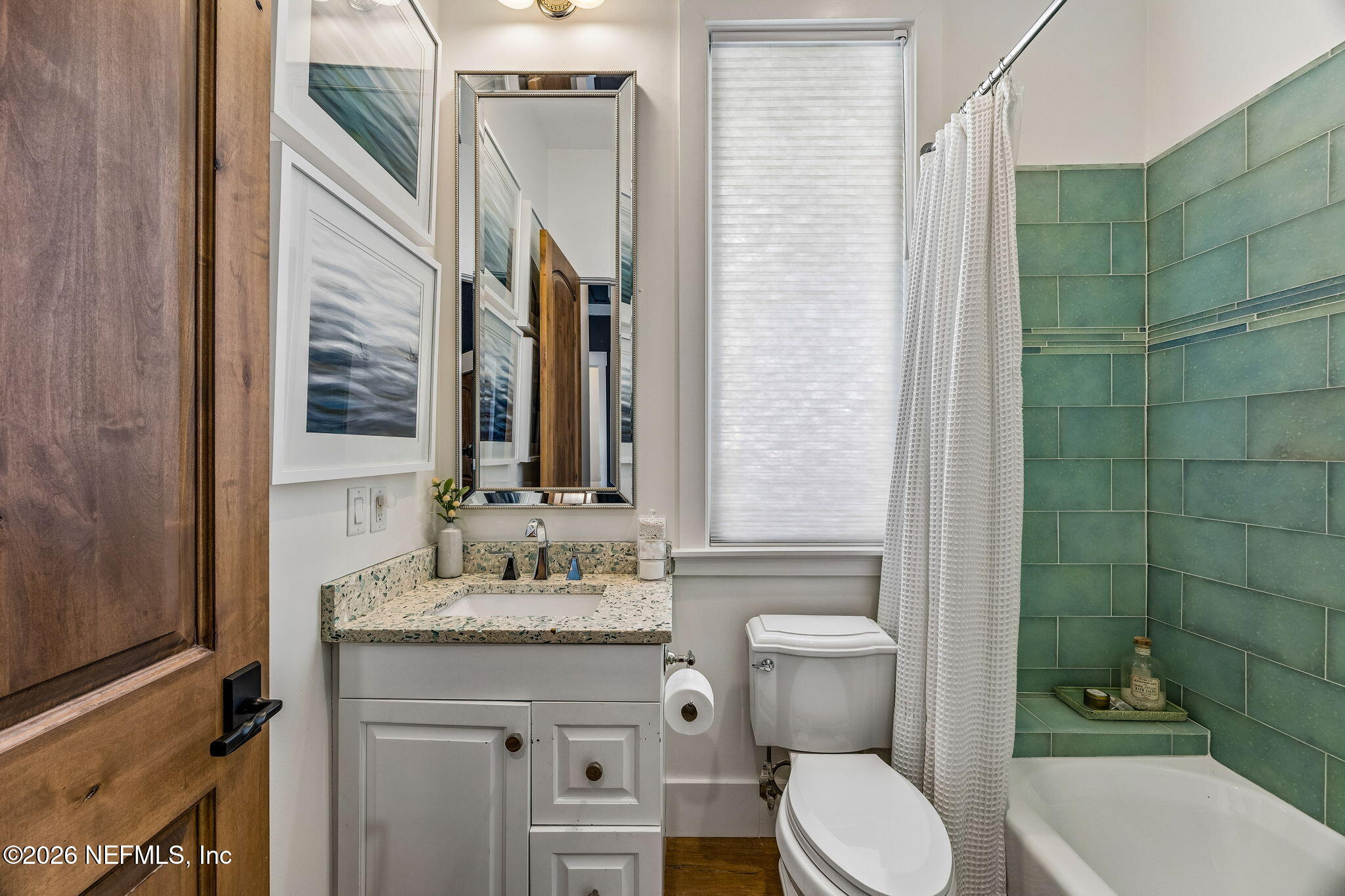4 Ocean Ridge Court Ponte Vedra Beach, FL 32082 - Photo 48 of 132 a bathroom with a granite countertop toilet sink and mirror