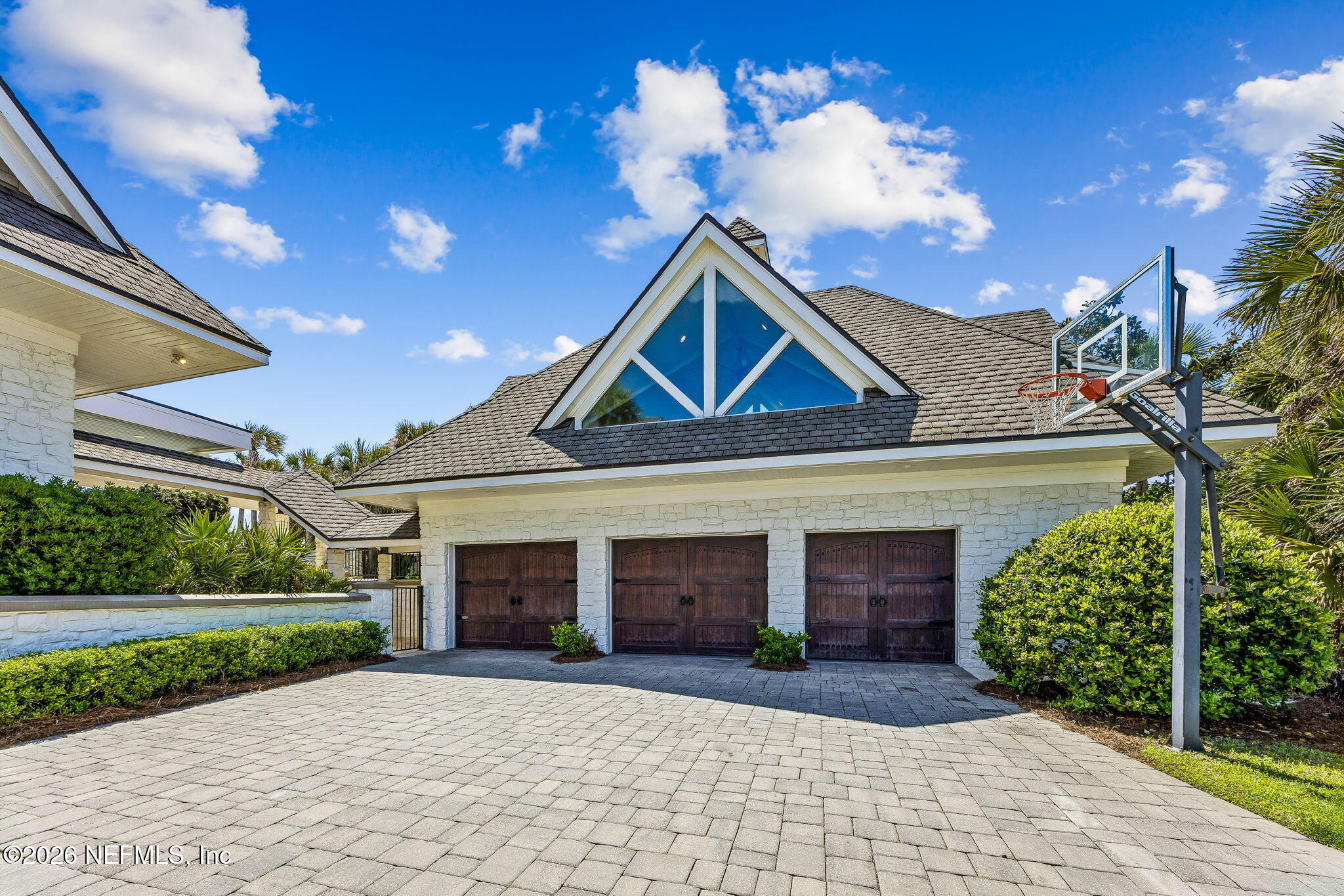 4 Ocean Ridge Court Ponte Vedra Beach, FL 32082 - Photo 5 of 132 a front view of a house with yard