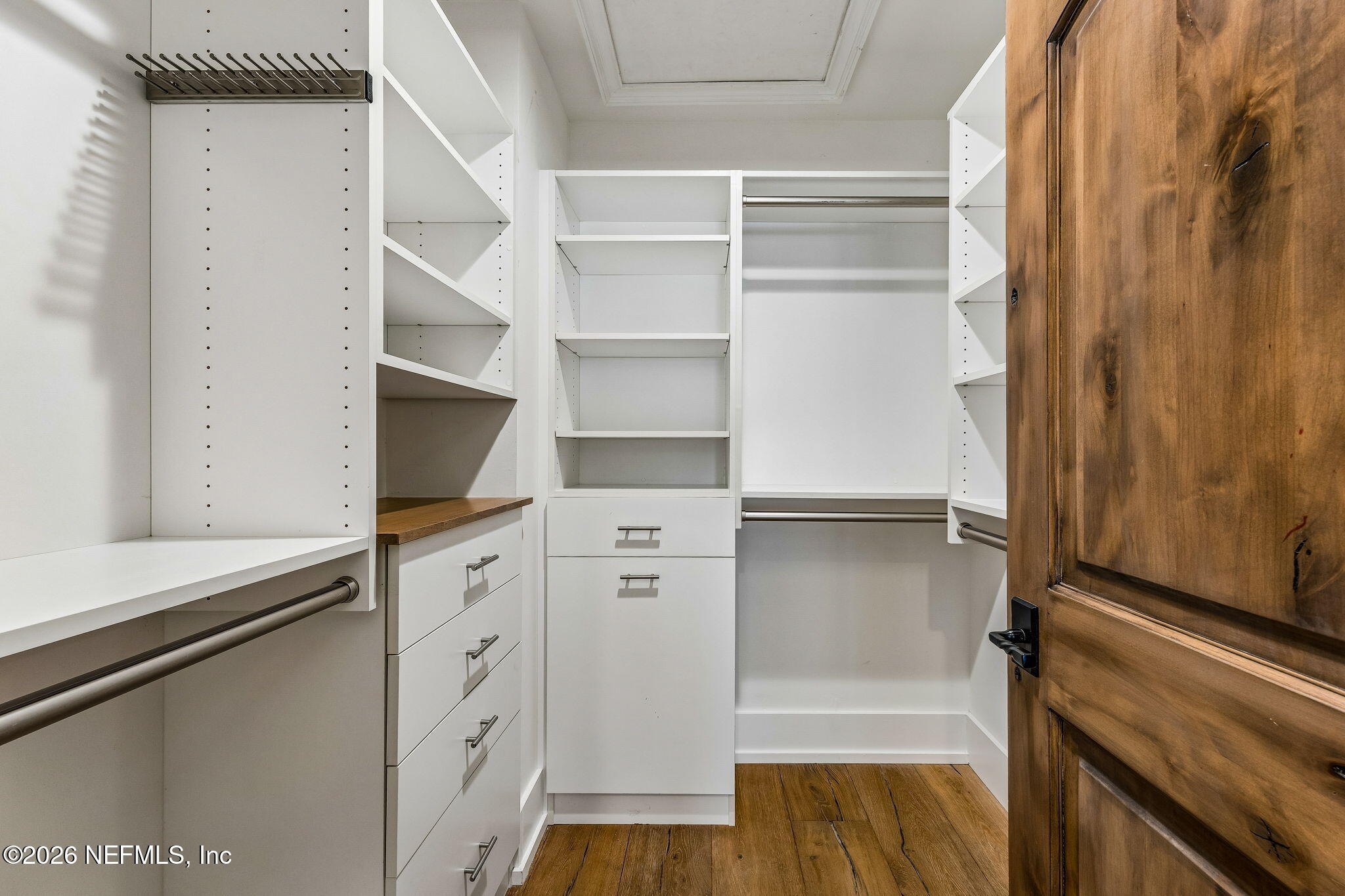4 Ocean Ridge Court Ponte Vedra Beach, FL 32082 - Photo 69 of 132 a view of walk in closet with empty racks