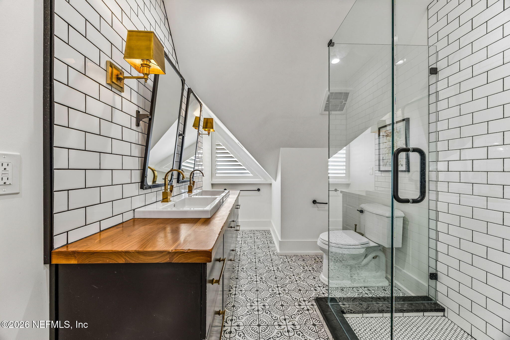 4 Ocean Ridge Court Ponte Vedra Beach, FL 32082 - Photo 70 of 132 a bathroom with a sink and a mirror