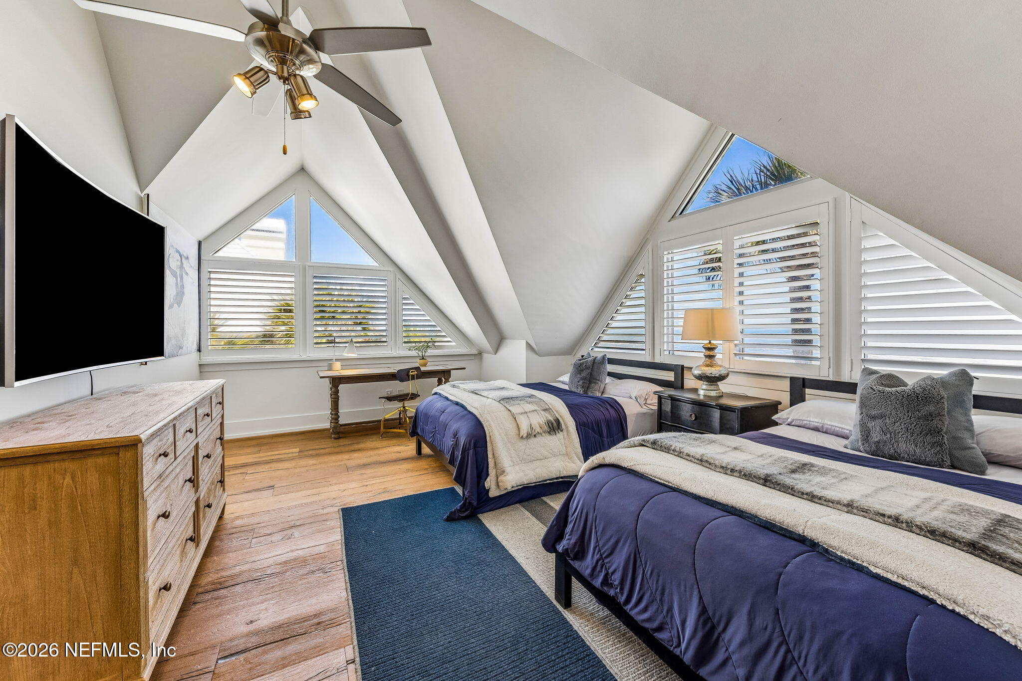 4 Ocean Ridge Court Ponte Vedra Beach, FL 32082 - Photo 71 of 132 a bedroom with two beds and a flat screen tv