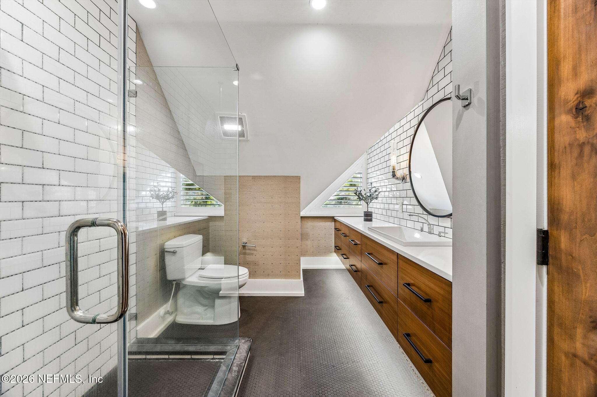 4 Ocean Ridge Court Ponte Vedra Beach, FL 32082 - Photo 73 of 132 a bathroom with a granite countertop sink and a mirror