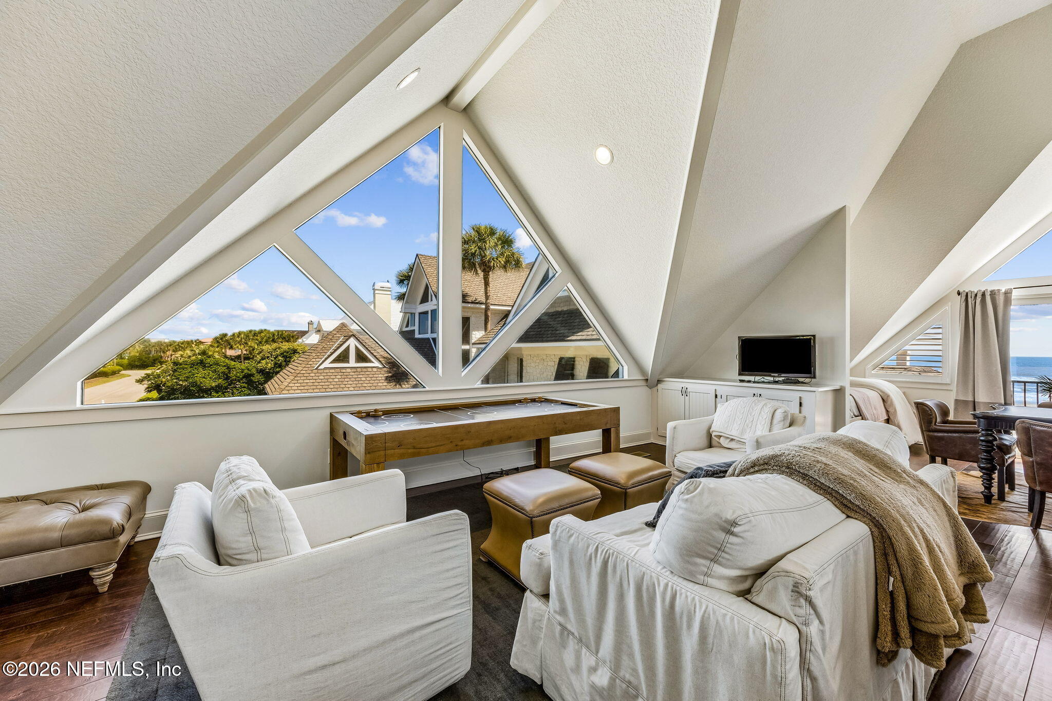 4 Ocean Ridge Court Ponte Vedra Beach, FL 32082 - Photo 86 of 132 a living room with furniture and a floor to ceiling window