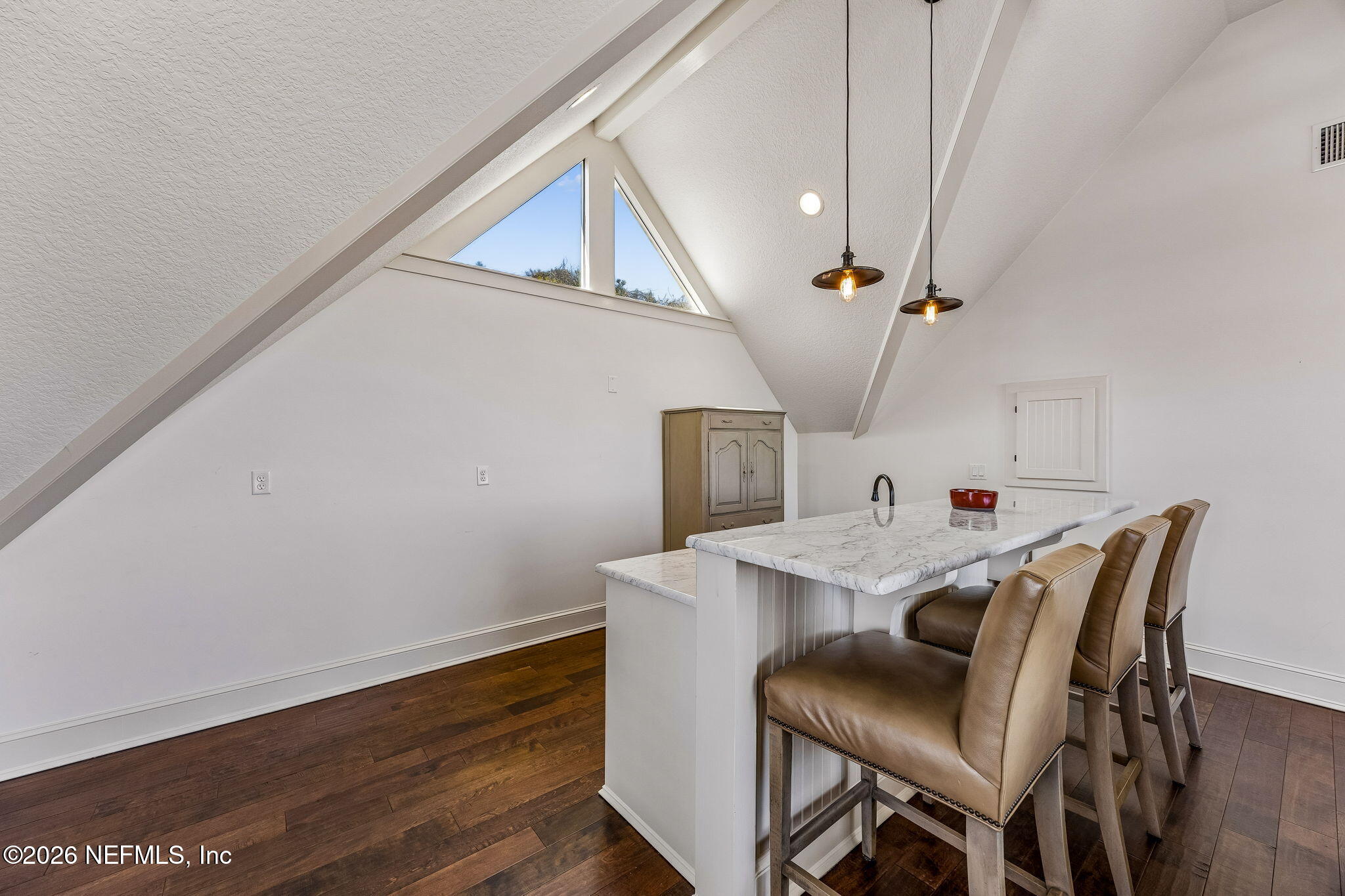 4 Ocean Ridge Court Ponte Vedra Beach, FL 32082 - Photo 88 of 132 a view of a dining room with furniture and wooden floor