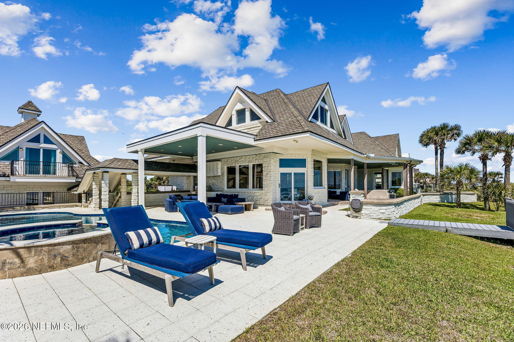 4 Ocean Ridge Court Ponte Vedra Beach, FL 32082 - Photo 97 of 132 a view of a house with swimming pool and sitting area