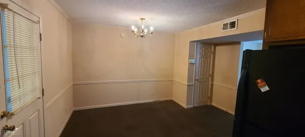 a view of a livingroom with a windows