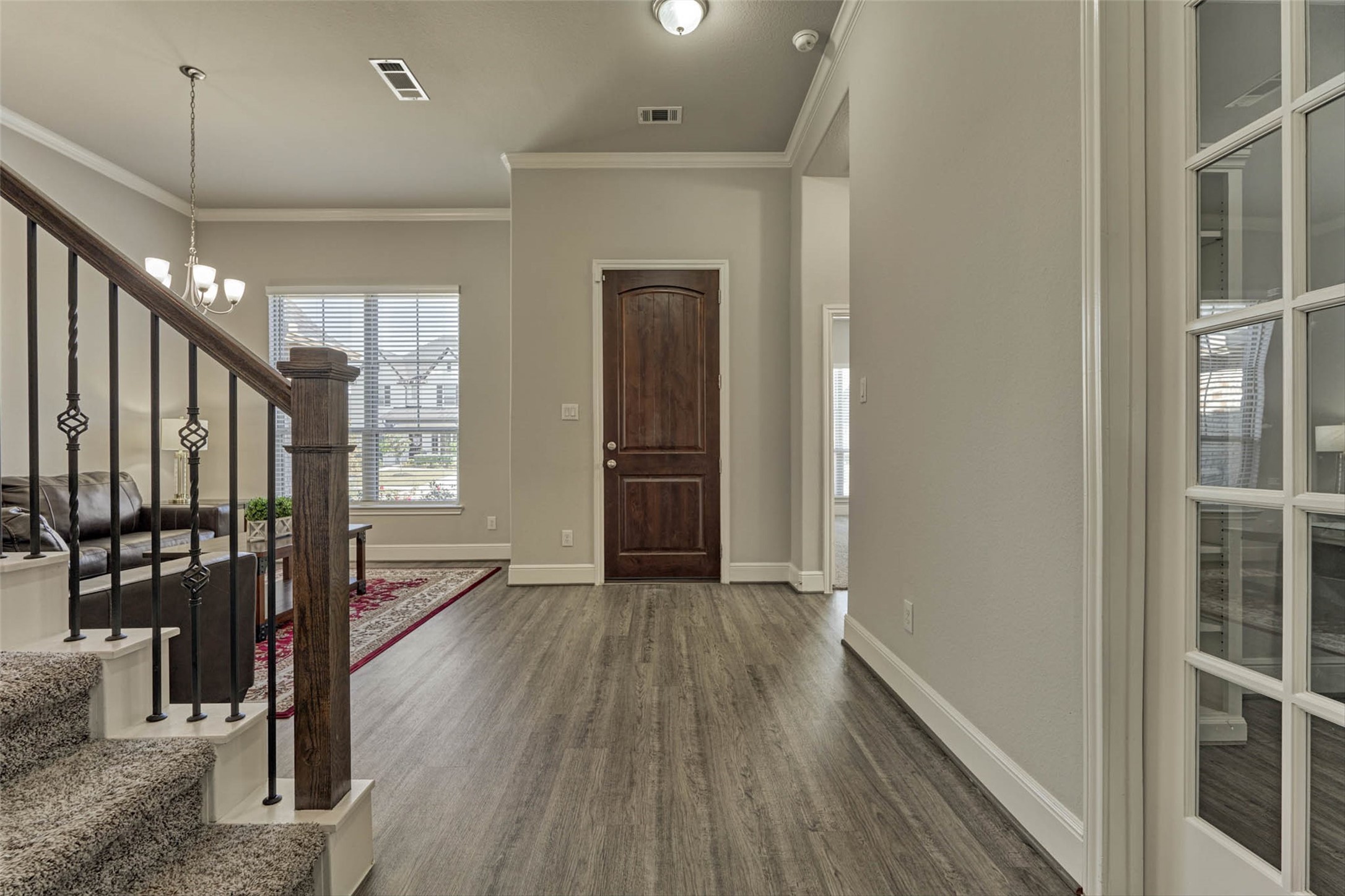 10660 Red Tail Place Conroe, TX 77385 - Photo 16 of 50 wooden floor in an empty room