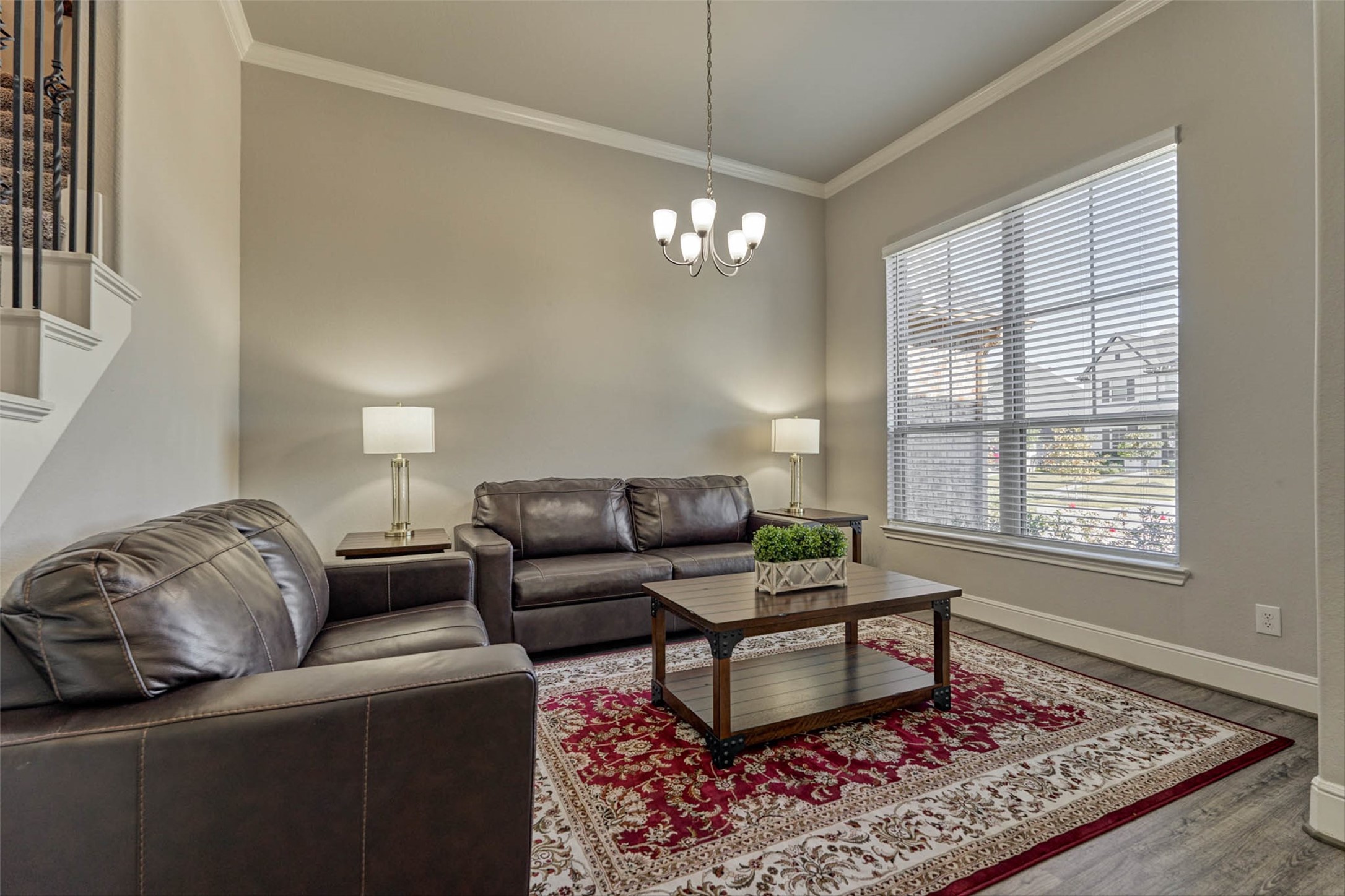 10660 Red Tail Place Conroe, TX 77385 - Photo 17 of 50 a living room with furniture and a rug