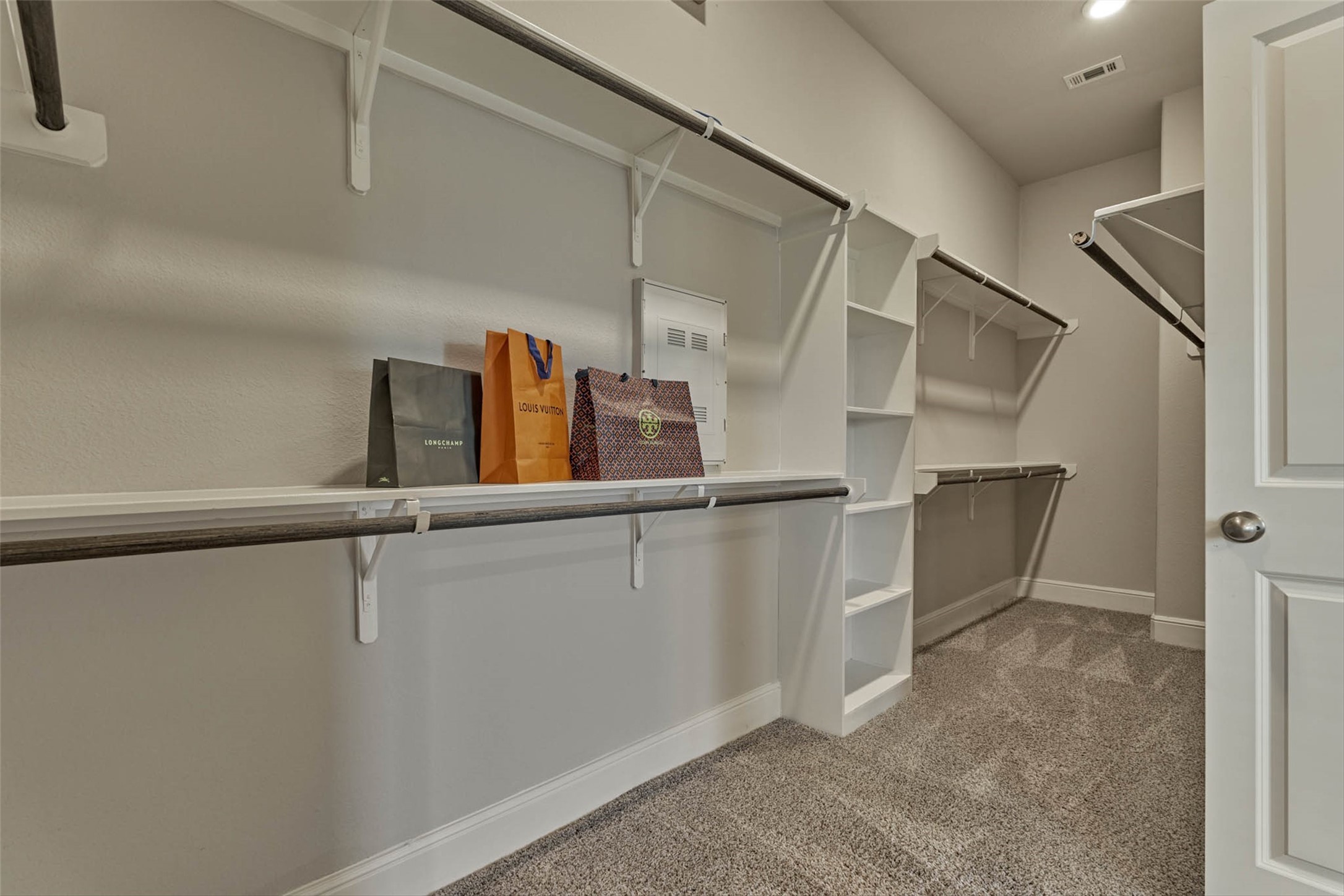 10660 Red Tail Place Conroe, TX 77385 - Photo 25 of 50 a view of a air conditioner from the hallway