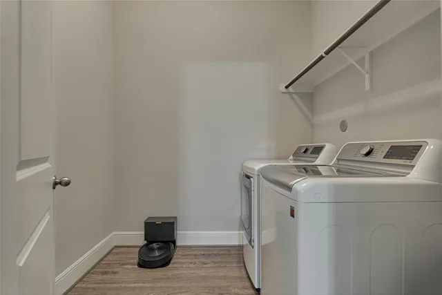 a utility room with dryer and washer