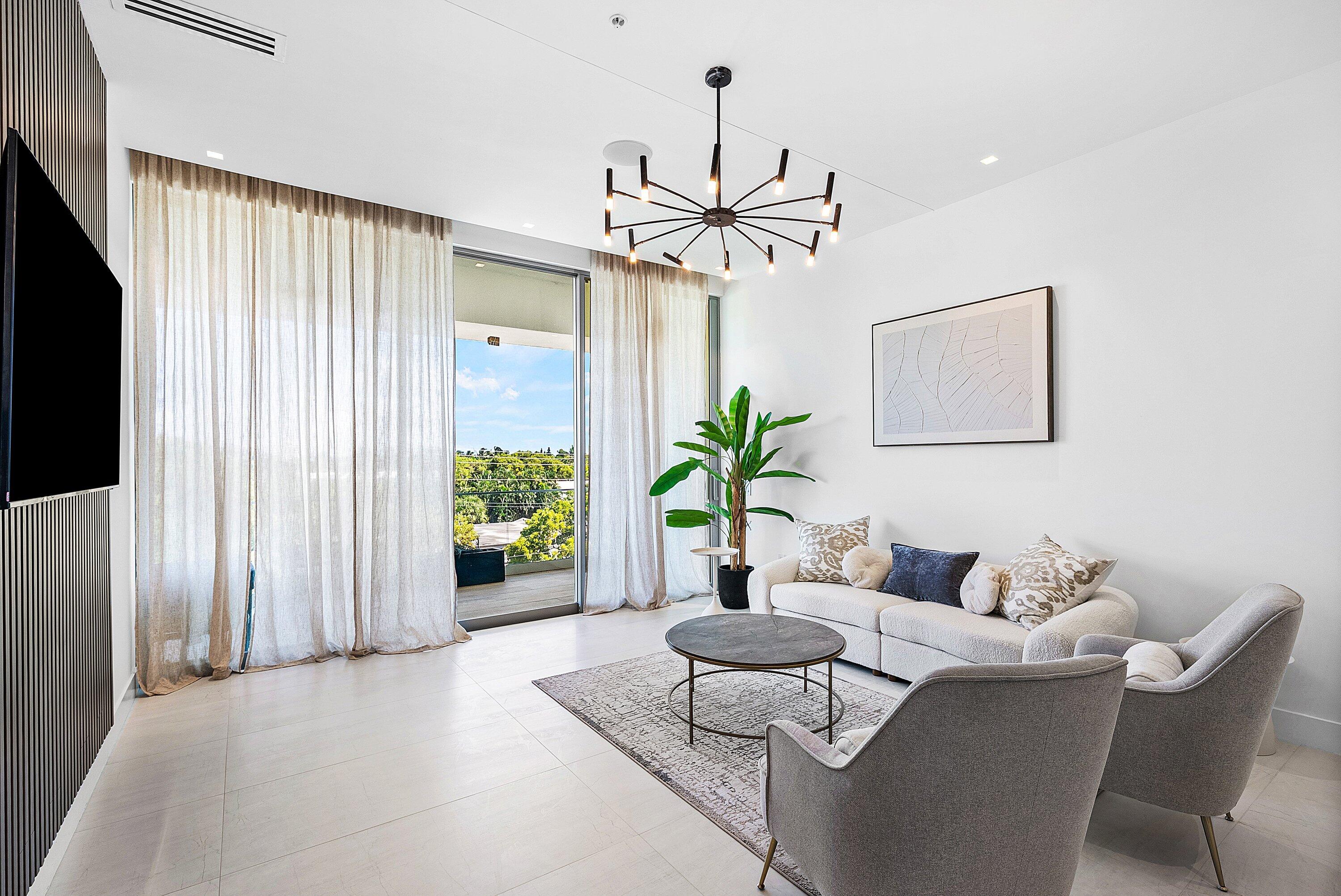246 Northeast 6th Avenue, Unit 3B Delray Beach, FL 33483 - Photo 7 of 23 a dining room with furniture and window