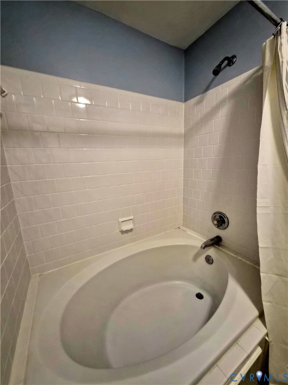4099 Doe Run Road Hopewell, VA 23860 - Photo 26 of 35 a bathroom with a tub and shower