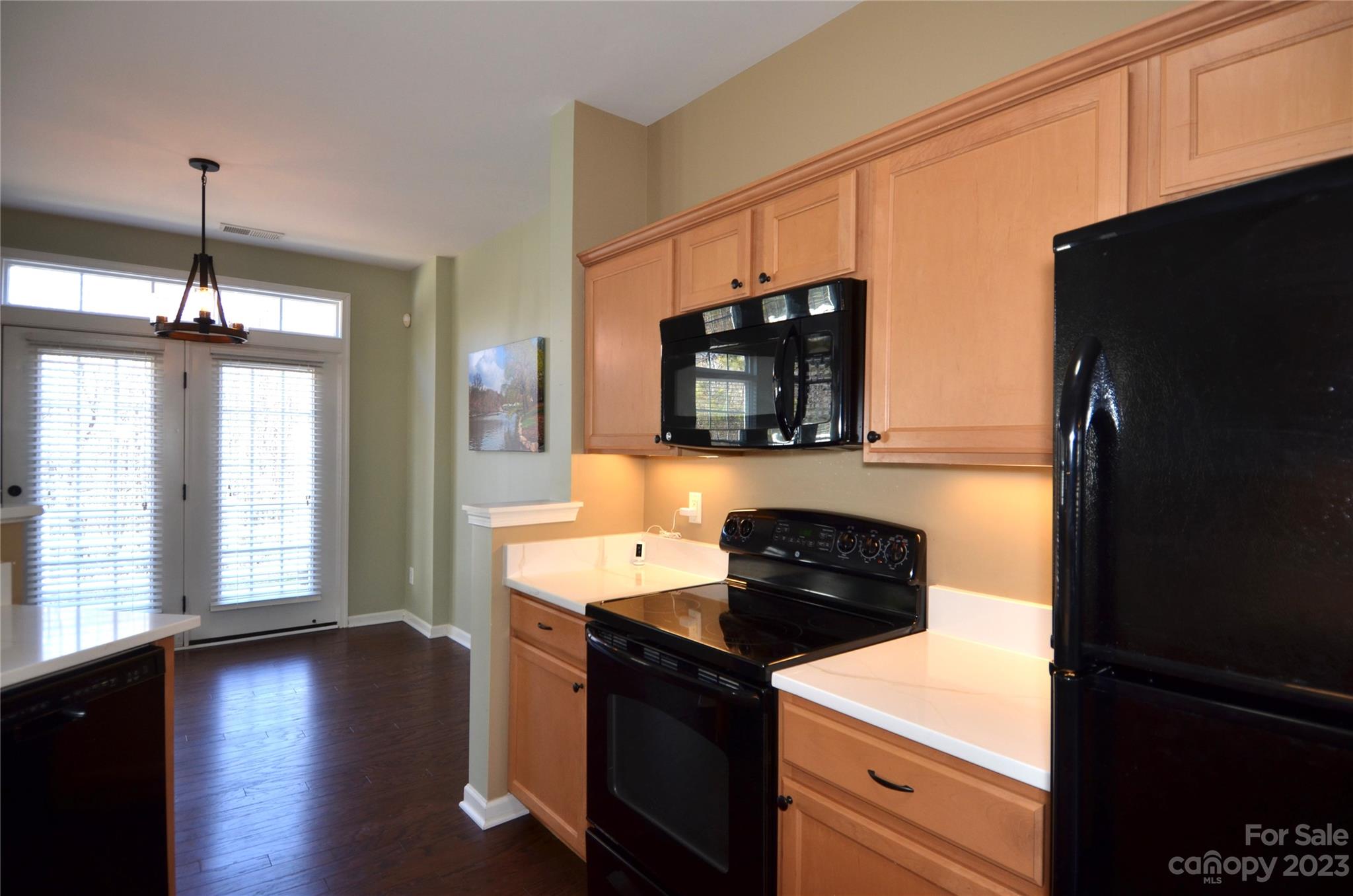 743 Prospect Lane Fort Mill, SC 29708 - Photo 4 of 24 a kitchen with a refrigerator a stove and a window