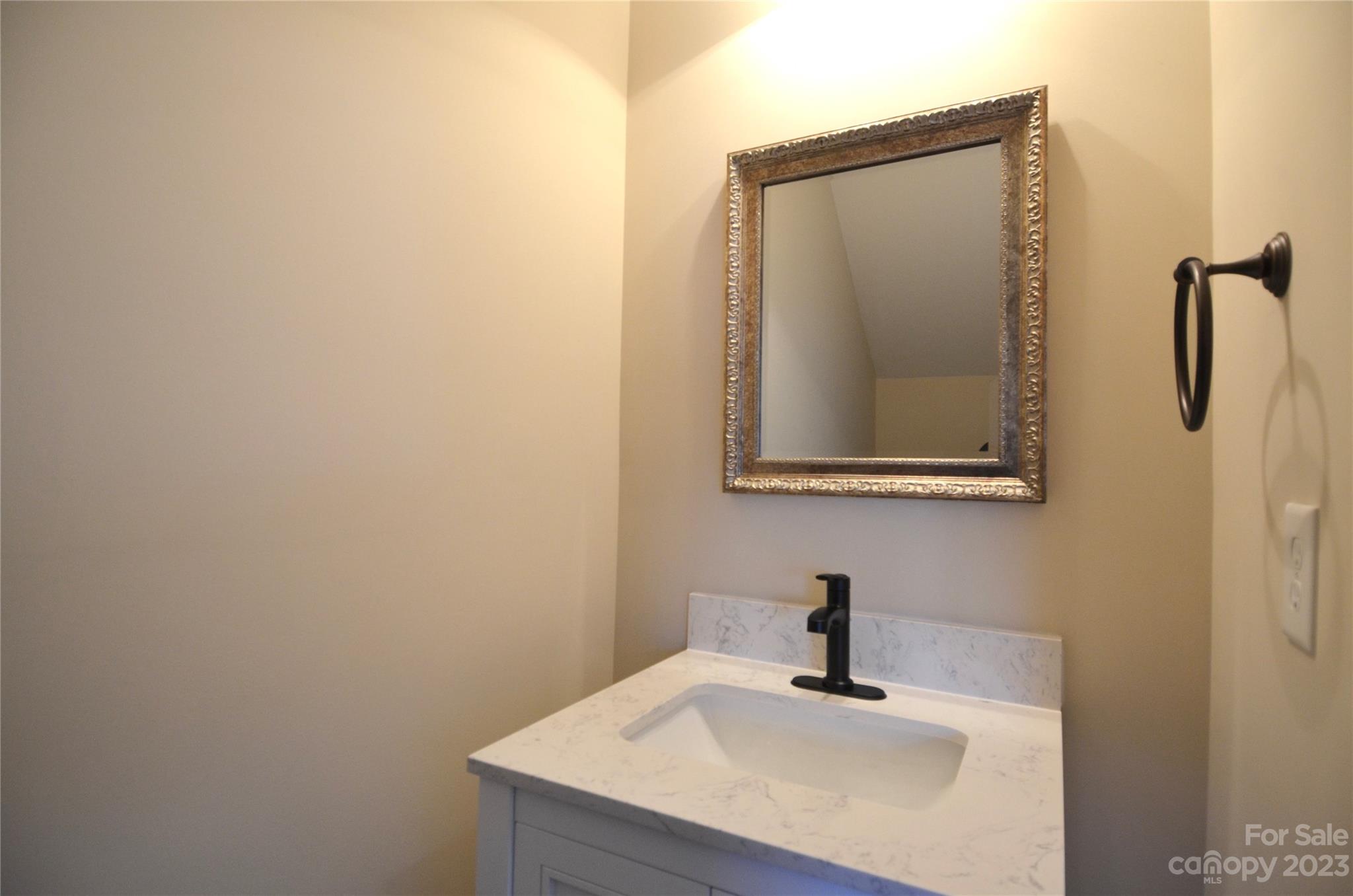 743 Prospect Lane Fort Mill, SC 29708 - Photo 8 of 24 a bathroom with a sink and mirror