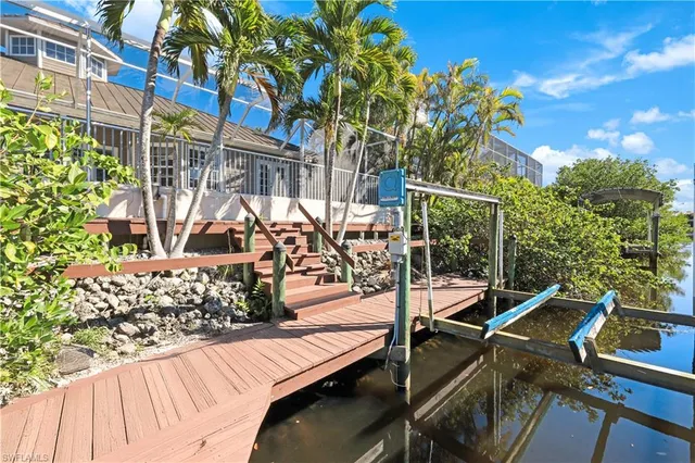 a view of a balcony with chairs