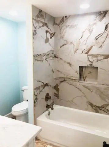 a bathroom with a sink and a toilet