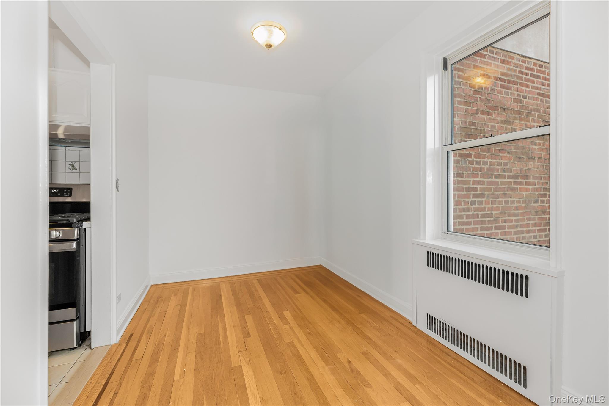 766 Palmer Road, Unit 2D Bronxville, NY 10708 - Photo 14 of 21 a view of a room with wooden floor and entryway